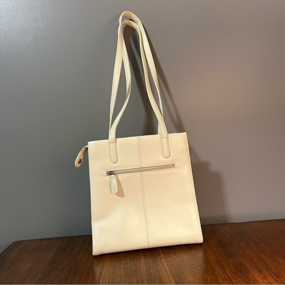 Dillards vintage Leather Ivory Purse
Perforated Diamond Pattern - Picture 2 of 13